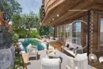 Zweitwohnsitz: Luxuriöse Gartenwohnung mit privaten Pool in Ski In/Ski Out Lage von Leogang!